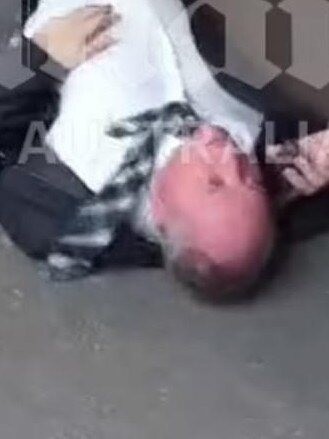 Barnaby Joyce was filmed lying on the footpath: Picture: Daily Mail Australia