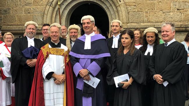 NSW District Court Judge Sean Grant, centre.