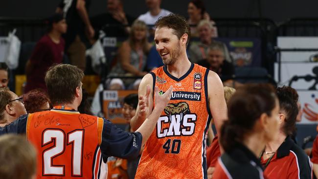                         <s1>TEAM PLAYER: Cairns Taipans captain Alex Loughton shakes hands with Taipans fans after the round 16 National Basketball League (NBL) match between the Snakes and the Adelaide 36ers, held at the Cairns Convention Centre.</s1>                        <ld pattern=" "/>                        <source> Picture: BRENDAN RADKE. </source>                     