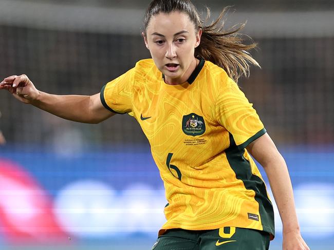 SYDNEY, AUSTRALIA - JUNE 03: Clare Wheeler of Australia kicks the ball during the international friendly match between Australia Matildas and China PR at Accor Stadium on June 03, 2024 in Sydney, Australia. (Photo by Cameron Spencer/Getty Images)