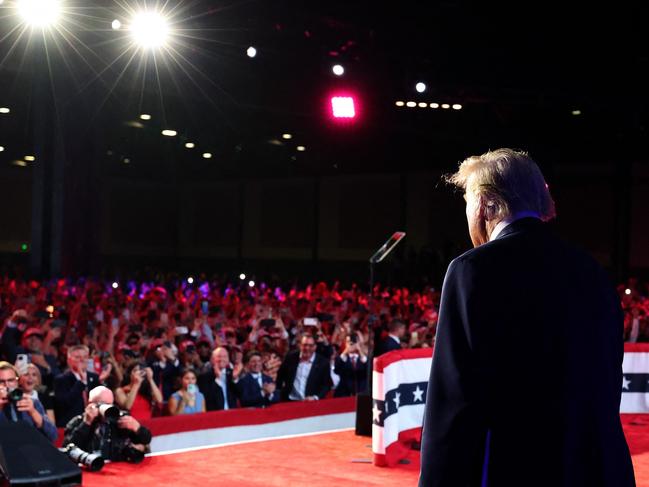 WEST PALM BEACH, FLORIDA - NOVEMBER 06: Republican presidential nominee, former U.S. President Donald Trump arrives to speak during an election night event at the Palm Beach Convention Center on November 06, 2024 in West Palm Beach, Florida. Americans cast their ballots today in the presidential race between Republican nominee former President Donald Trump and Vice President Kamala Harris, as well as multiple state elections that will determine the balance of power in Congress.   Win McNamee/Getty Images/AFP (Photo by WIN MCNAMEE / GETTY IMAGES NORTH AMERICA / Getty Images via AFP)