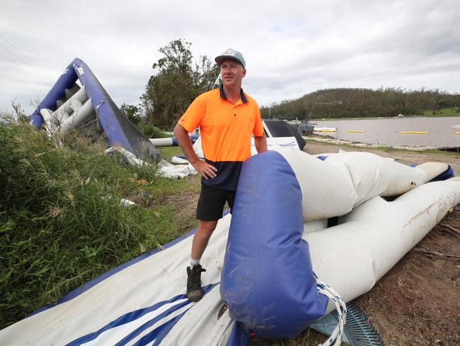 Gold Coast Wake Park in Oxenford has been completely smashed by the floods. Owner Daniel Watkins and staff trying to clean the place so they can reopen on the weekend. Picture Glenn Hampson