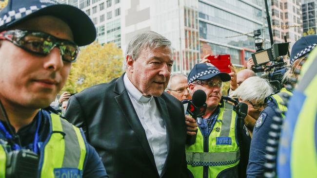 Cardinal George Pell arriving at court in Melbourne in 2018. When it comes to two-tier policing, there is no more striking example than the malicious pursuit of and misapplied justice meted out to the late Cardinal. Picture: AP Photo/Asanka Brendon Ratnayake