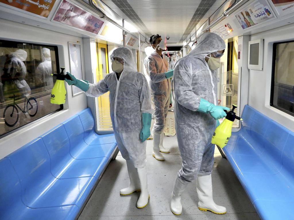 Workers disinfect subway trains in Tehran, Iran after reports of many deaths nationwide from the coronavirus. Picture: AP