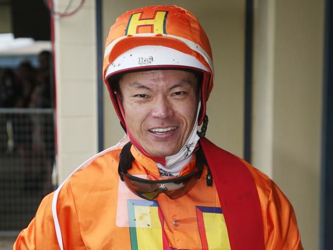 Masayuki Abe narrowly edged out Sylvester to win Race 3 riding War General at the Banana Industry Race Day, held at the Innisfail Turf Club. Picture: Brendan Radke