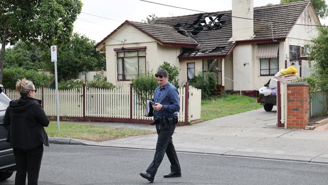 Police probe a suspicious fire at a home in Braybrook in Melbourne’s west. Picture: David Crosling