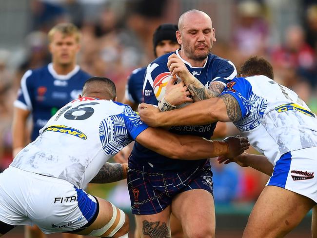 CAIRNS, AUSTRALIA - NOVEMBER 11:  Dale Ferguson of Scotland is tackled during the 2017 Rugby League World Cup match between Samoa and Scotland at Barlow Park on November 11, 2017 in Cairns, Australia.  (Photo by Ian Hitchcock/Getty Images)