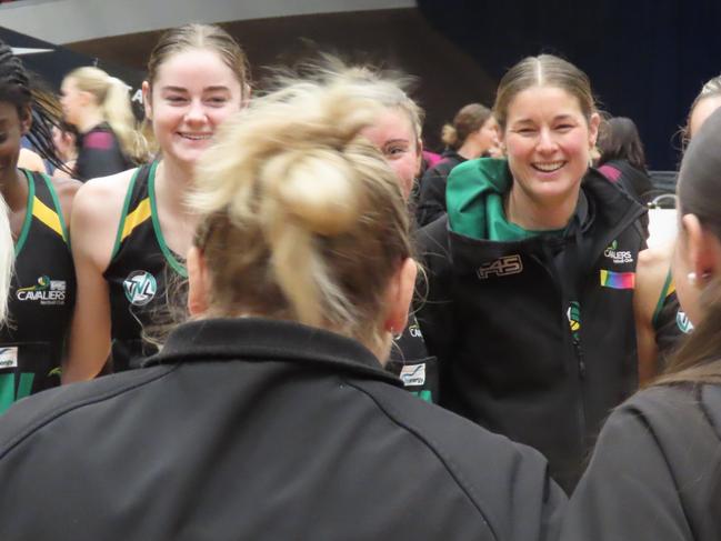 Cavaliers coach Dannie Carstens is all smiles addressing her team after Saturday's win over Cripps Waratah. Picture: Jon Tuxworth