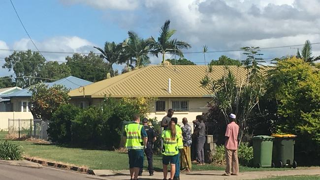 Emergency services respond to the occupant who evacuated from the house fire on Leopold St, Aitkenvale on Tuesday, March 31, 2020. Photo: Evan Morgan