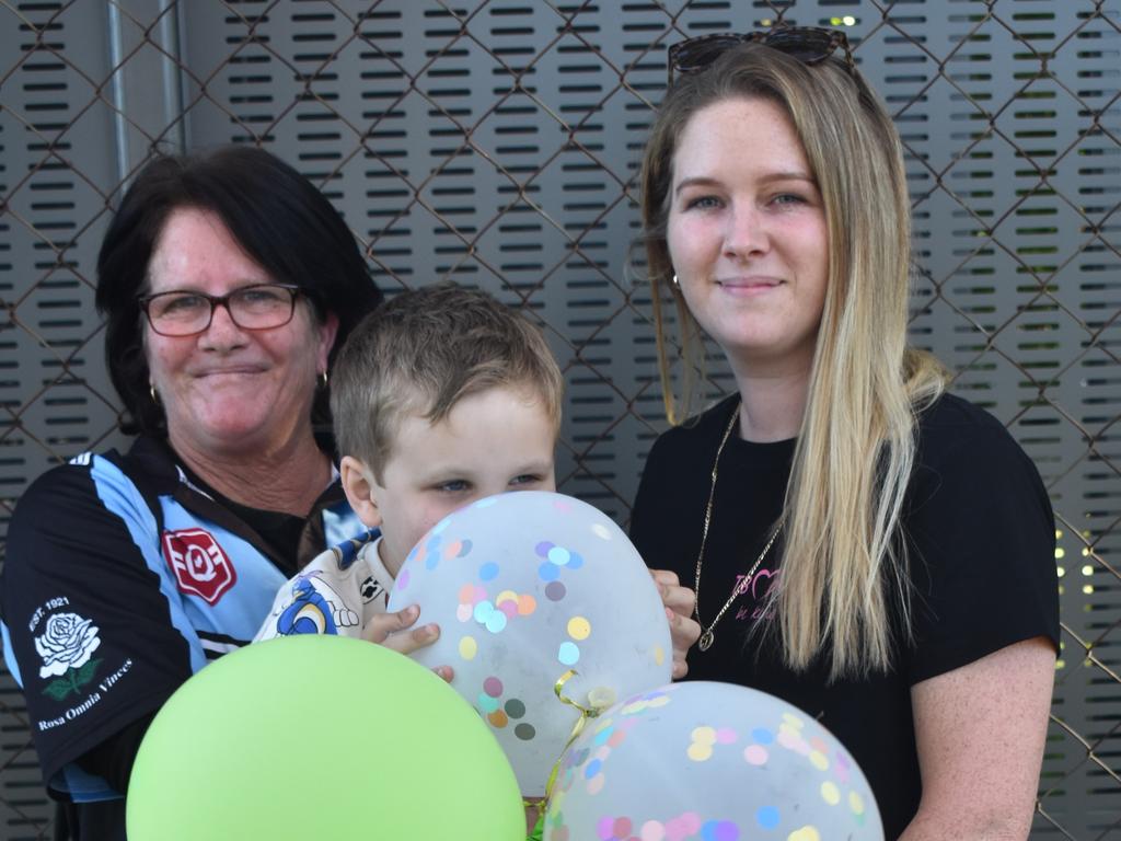 Jo Rickson, Blake Palmer and Jaime McHugh at Norths Chargers' inaugural TBMMBEKIND Day at the Gymmy Grounds, Rockhampton, on July 20, 2024.