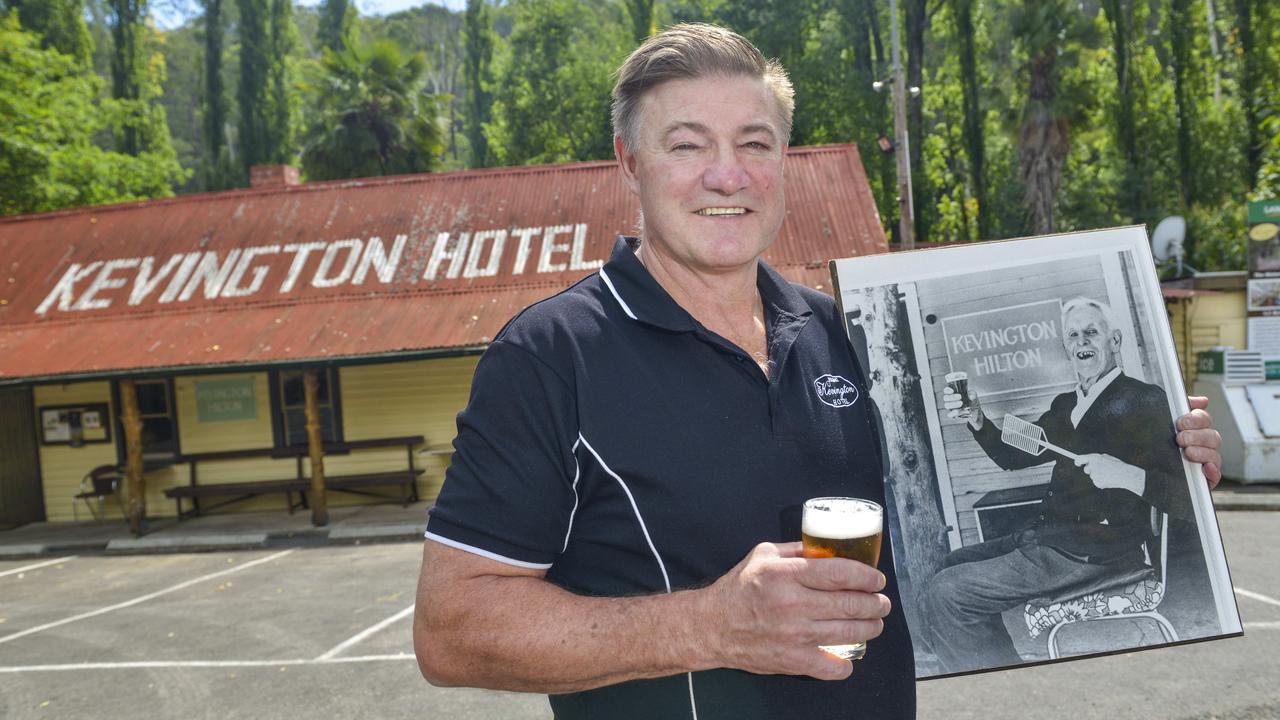 Wanye Poole with a picture of his granfather Clarrie in front of the Kevington Hotel. Picture: Dannika Bonser