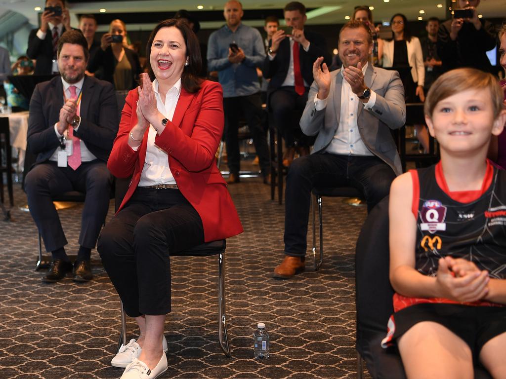 Premier Annastacia Palaszczuk reacts as she watches the announcement. Picture: NCA NewsWire / Dan Peled