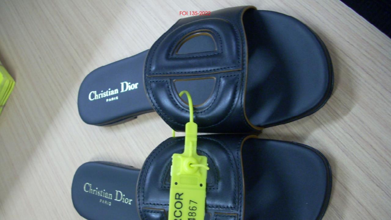 A pair of Christian Dior slides found in Melissa Caddick’s wardrobe.