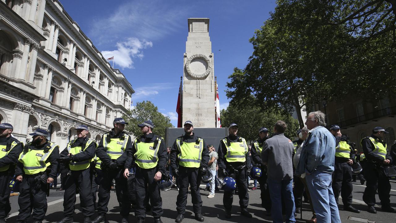 Police secure the area around The Cenotaph war memorial, facing far-right demonstrators protesting against an expected Black Lives Matter demonstration. Picture: Jonathan Brady/PA via AP