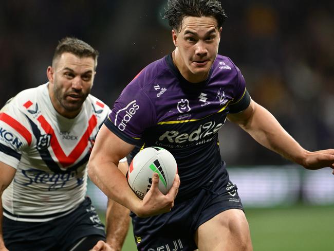 MELBOURNE, AUSTRALIA - SEPTEMBER 27: Jack Howarth of the Storm runs the ball during the NRL Preliminary Final match between the Melbourne Storm and Sydney Roosters at AAMI Park on September 27, 2024 in Melbourne, Australia. (Photo by Quinn Rooney/Getty Images)