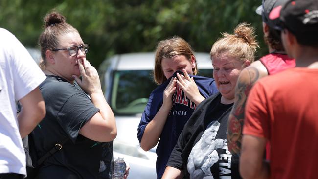 Slacks Creek locals react to the news the missing boy has been found dead. Picture: Lachie Millard