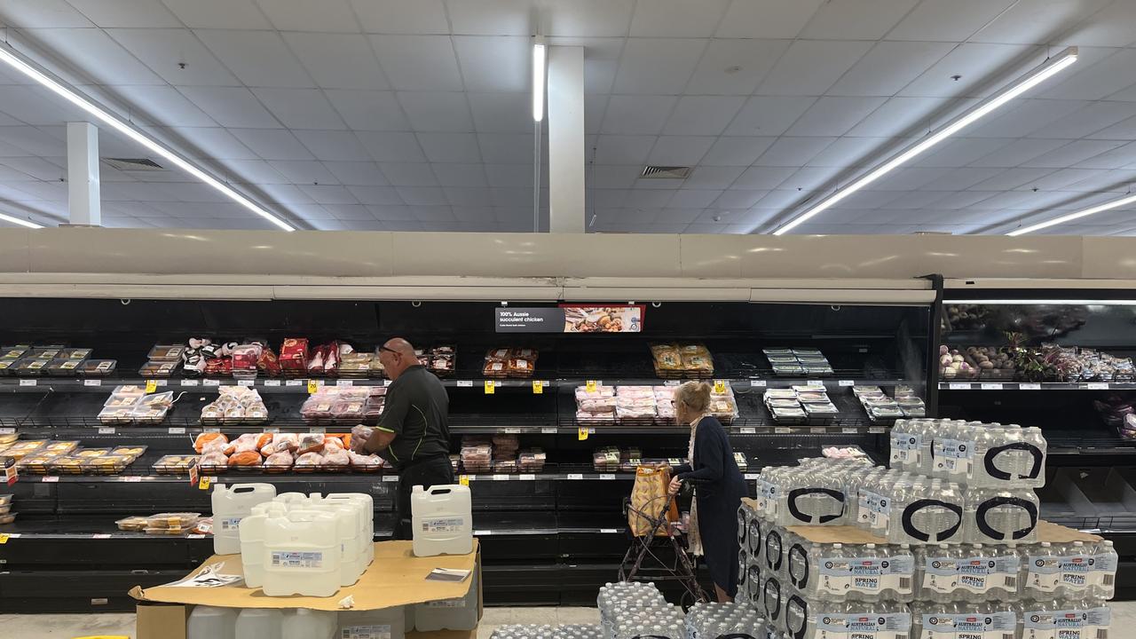 Essential items such as water stocked up while meat shelves run low at Coles Sydney Street