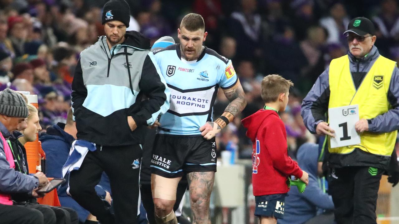 Josh Dugan limps off for the Sharks