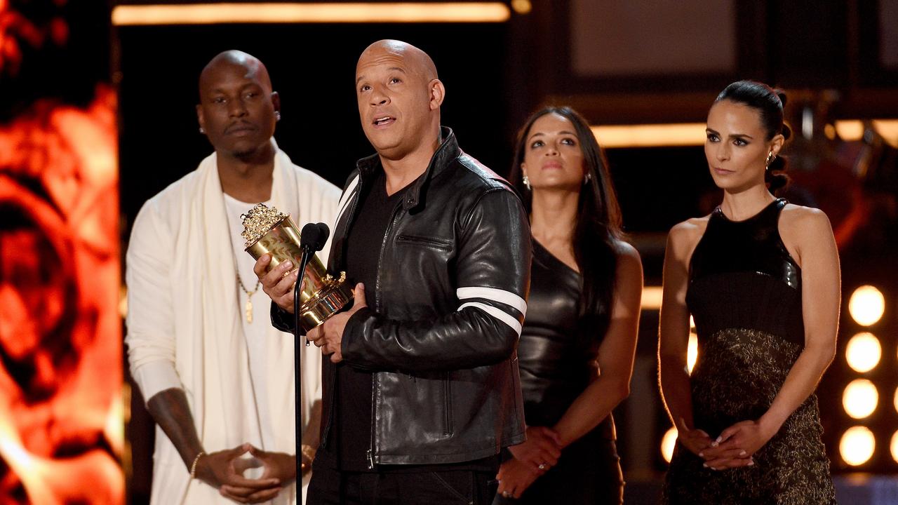 Tyrese Gibson with Fast and Furious co-stars Vin Diesel, Michelle Rodriguez, and Jordana Brewster. (Photo by Kevork Djansezian/Getty Images)