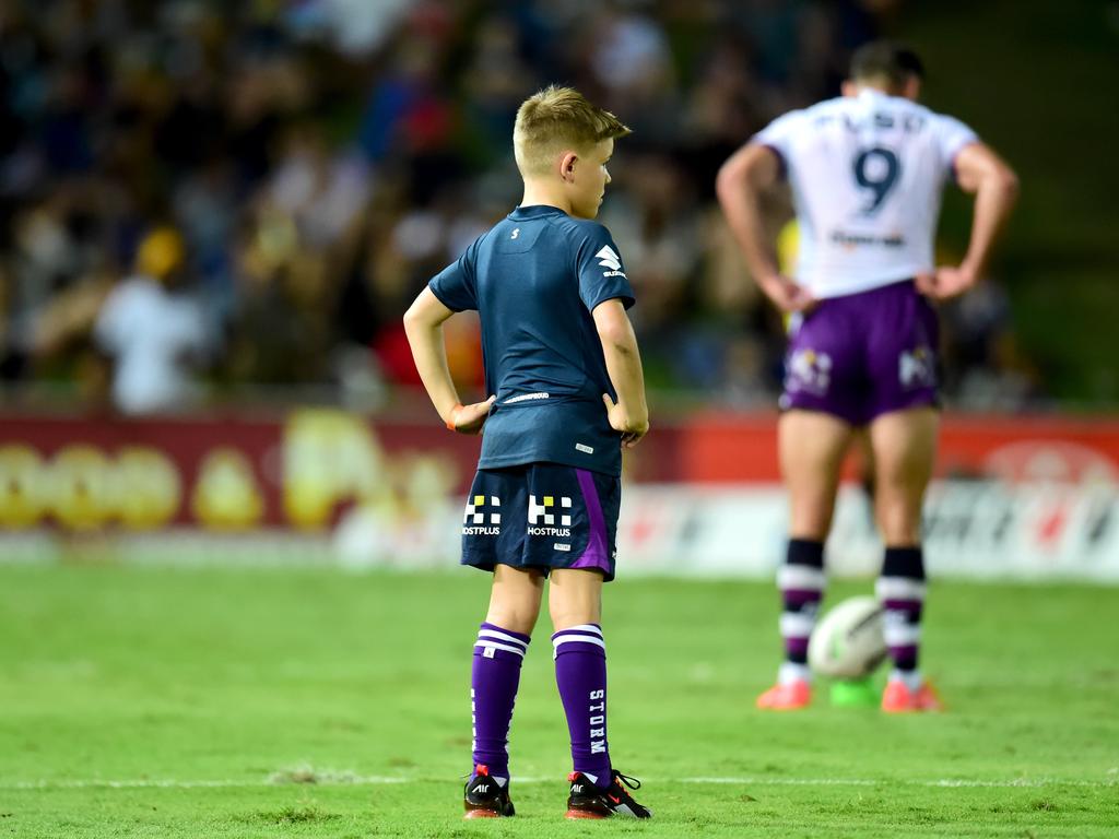 Jasper Smith on the field with dad. Picture: Alix Sweeney