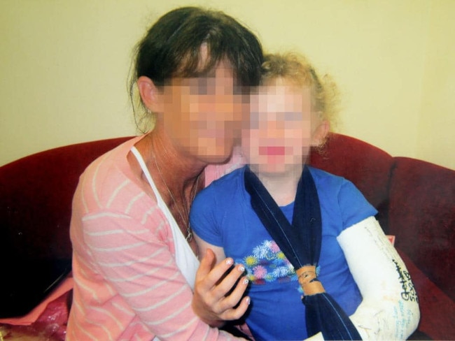 Smiles: Betty Colt and her youngest daughter Carmen smile for the camera at a recent contact meeting. Carmen told interviewers her father was her uncle Charlie. She had never seen toilet paper and said she had sex with her family members. It remains unclear why she is wearing a sling in this photo.