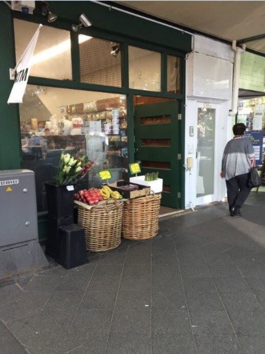 A photo of the former fruit shop where the store would have been located.