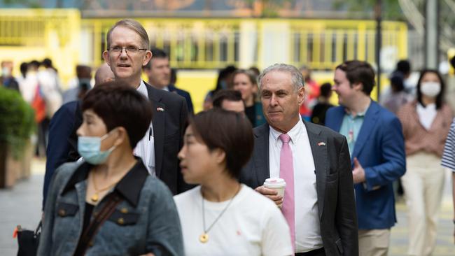 Australia’s Ambassador to China, Graham Fletcher, and Senator Farrell walk through an open-air mall in Chaoyang, Beijing. Picture: Supplied