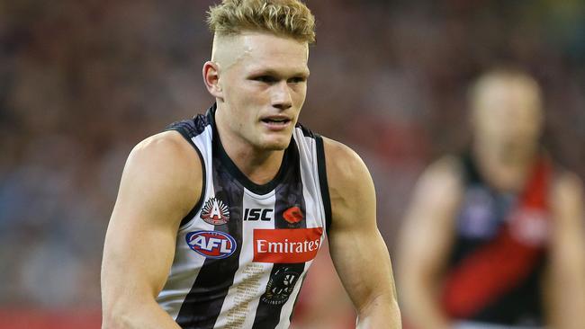 Collingwood’s Adam Treloar charges forward. Pic: Michael Klein