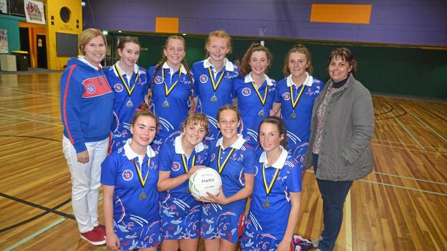 CLASSY TEAM: The Warwick 14 years netball team (back, from left) coach Deanna Naughten, Alexandra Rickert, Zara MacPherson, Abigail Skaines, Georgia Denny, Heidi Burton, manager Tammy Mullaly, (front) Bridget Hardy, Jessica Mullaly, Dakota Newton and Lily Nolan. Picture: Gerard Walsh