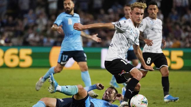 Nathaniel Atkinson battles with Sydney’s Adam Le Fondre last weekend. Picture: AAP