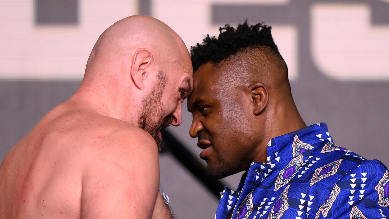 Tyson Fury and Francis Ngannou face off. (Photo by Justin Setterfield/Getty Images)