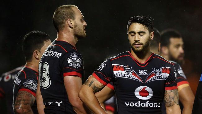 Simon Mannering and Shaun Johnson look dejected.