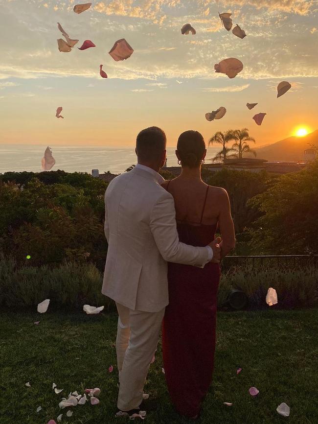 The Warners were showered in petals during the wedding. Picture: Instagram.