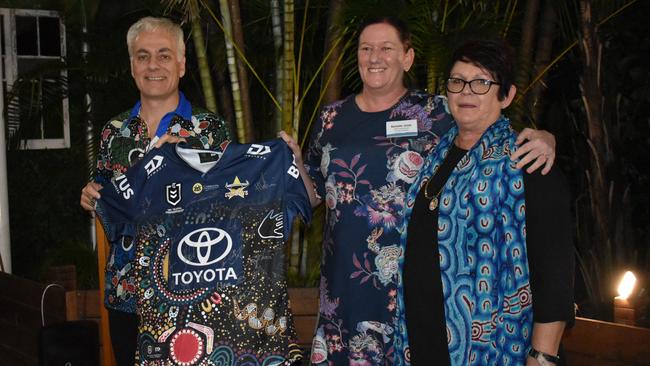NQBP CEO Nicolas Fertin and NRL Cowboys House general manager Rochelle Jones present Bowen State School's Karenne Williams with a signed Indigenous Round Cowboys jersey at the Reconciliation in Action event at Grand View Hotel, Bowen. Picture: Kirra Grimes.