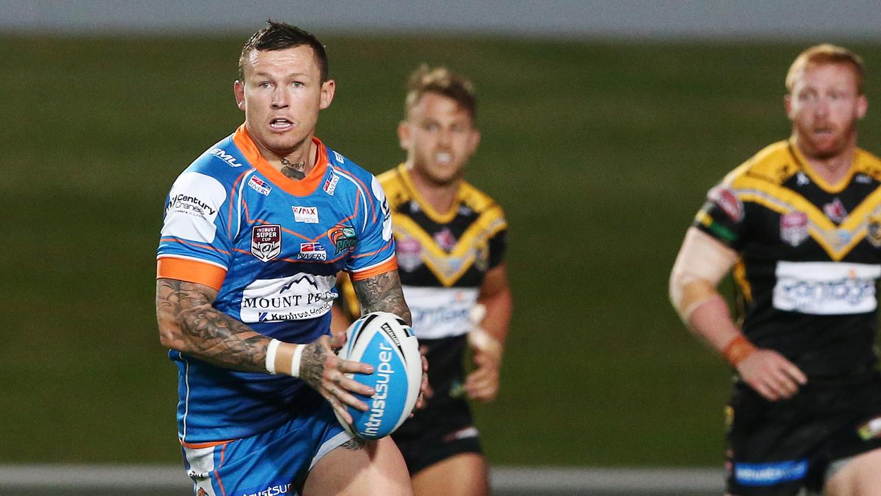 Action from the Intrust Super Cup Queensland Rugby League match between the Northern Pride and the Sunshine Coast Falcons. Pride's Todd Carney runs along the Falcons' defensive line. PICTURE: BRENDAN RADKE