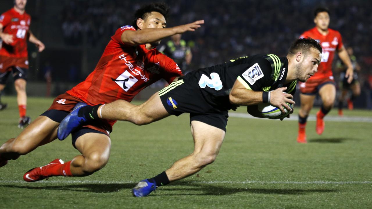 Hurricanes winger Wes Goosen scores a try during the Super Rugby match.