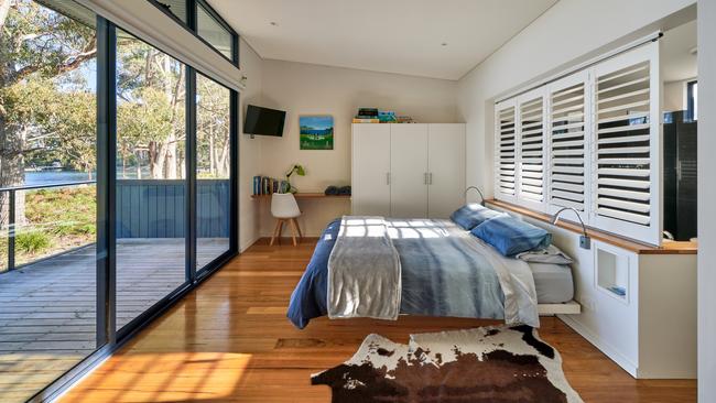 The master bedroom with a view at Stewarts Bay Beach House. Picture: Max Combi.