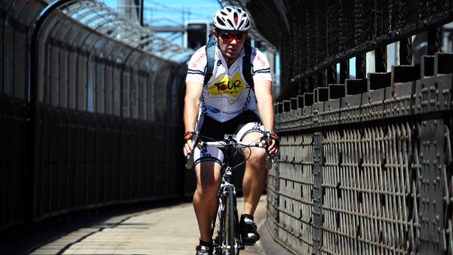 Jon Fryar cycles the bridge daily.