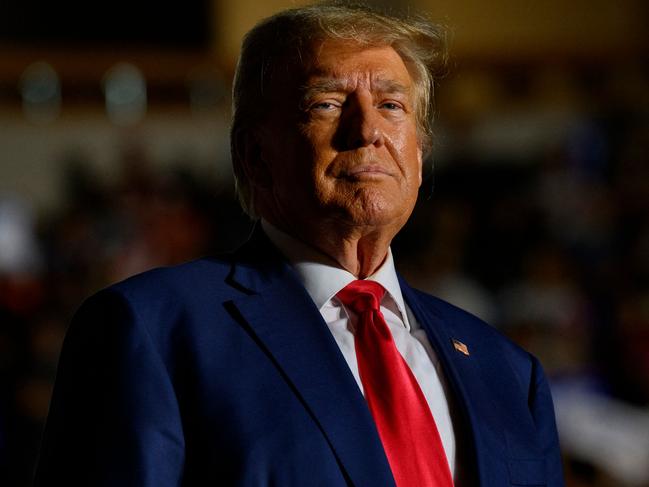 ERIE, PENNSYLVANIA - JULY 29: Former U.S. President Donald Trump enters Erie Insurance Arena for a political rally while campaigning for the GOP nomination in the 2024 election on July 29, 2023 in Erie, Pennsylvania.   Jeff Swensen/Getty Images/AFP (Photo by JEFF SWENSEN / GETTY IMAGES NORTH AMERICA / Getty Images via AFP)