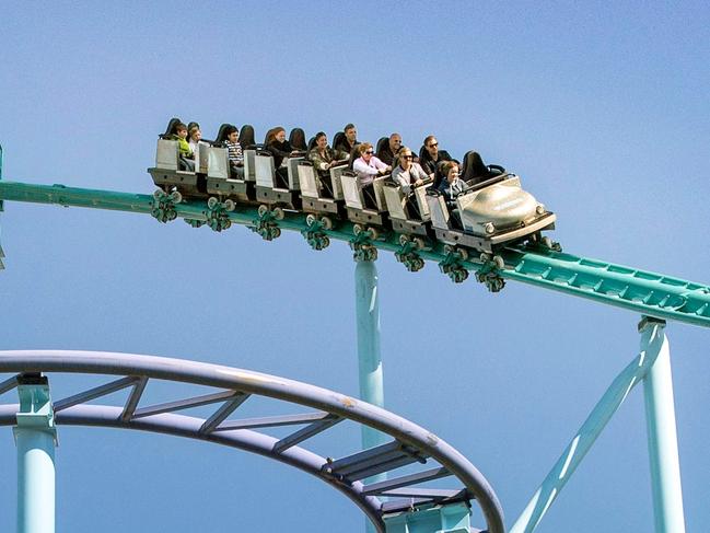 This file photo taken on April 22, 2014 shows visitors taking a ride in a carriage of the Jetline roller coaster at the Grona Lund amusement park in Stockholm, Sweden. A carriage in the 'Jetline' roller coaster has derailed and fallen from a height of several meters. One person died and several people have been injured, according to Swedish media reports on June 25, 2023. The amusement park is being evacuated and the police have set up cordons. (Photo by Claudio BRESCIANI / TT News Agency / AFP) / Sweden OUT
