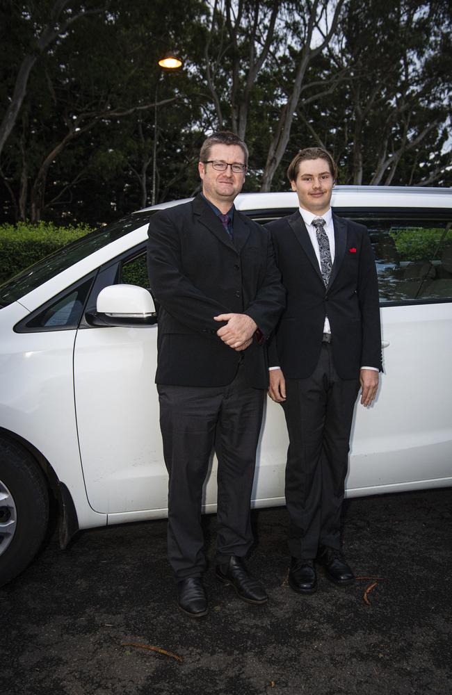 Graduate Alexander Butler with dad Sam Butler at Toowoomba Christian College formal at Picnic Point, Friday, November 29, 2024. Picture: Kevin Farmer