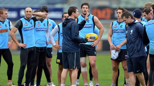 Brett Ratten leading a Carlton training session.