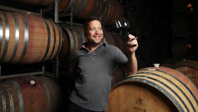 Winemaker Dan Buckle with his private label wine Circe. Picture: Aaron Francis