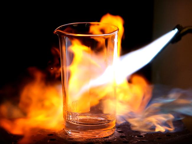 30/06/2016: Glass designer Mark Douglass & business manager Dean Jones, turn waste glass from the restaurant trade into useful objects, at 'Upcycled Glass' in Melbourne. Stuart McEvoy for The Australian.