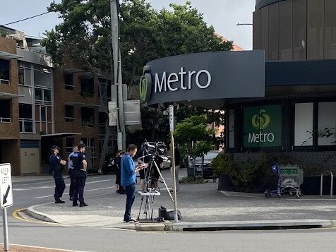 Police were called to an incident at the Woolworths Metro in Teneriffe, with reports a flare had been let off inside and Australia Day graffiti found inside.