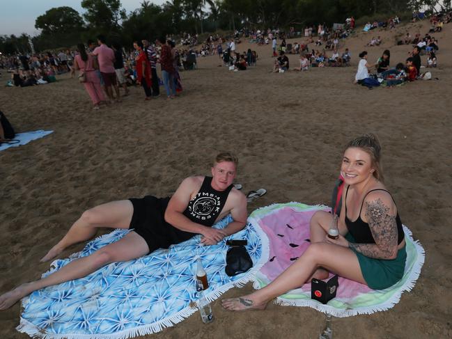 Jackson Leggate and Rachel Sharp join thousands of other Territorians as they gather along the shores of Darwin Harbour to celebrate Territory Day . Pic Glenn Campbell