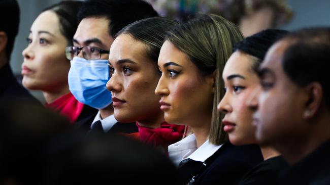 Qantas staff look on as chief executive Vanessa Hudson speaks at Hangar 96 on Thursday. Picture: Getty Images