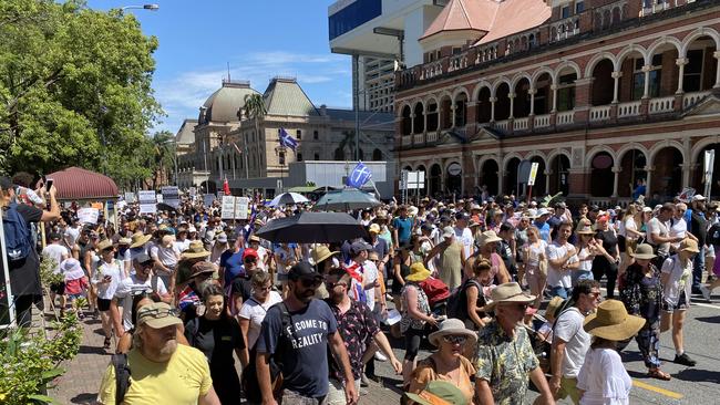 Anti-vaccination, anti-mandate protesters march in the Brisbane CBD on Saturday. Picture: Annette Dew