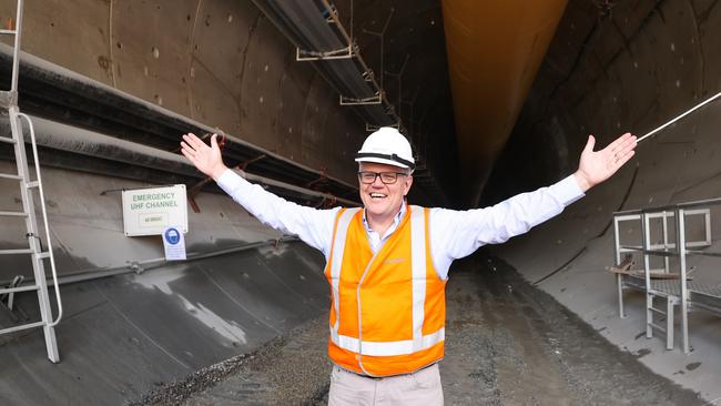 Prime Minister Scott Morrison poses for a photo while on a tour of the Snowy Hydro Lobs Hole site. Picture: Pool/Alex Ellinghausen