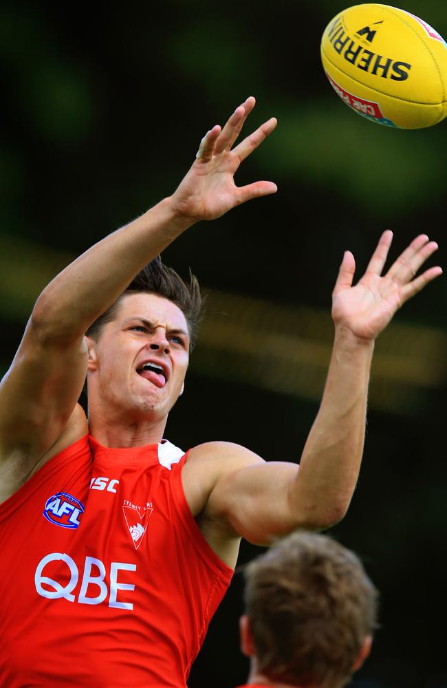 Callum Sinclair grabs a mark during Sydney Swans training. Picture: Mark Evans